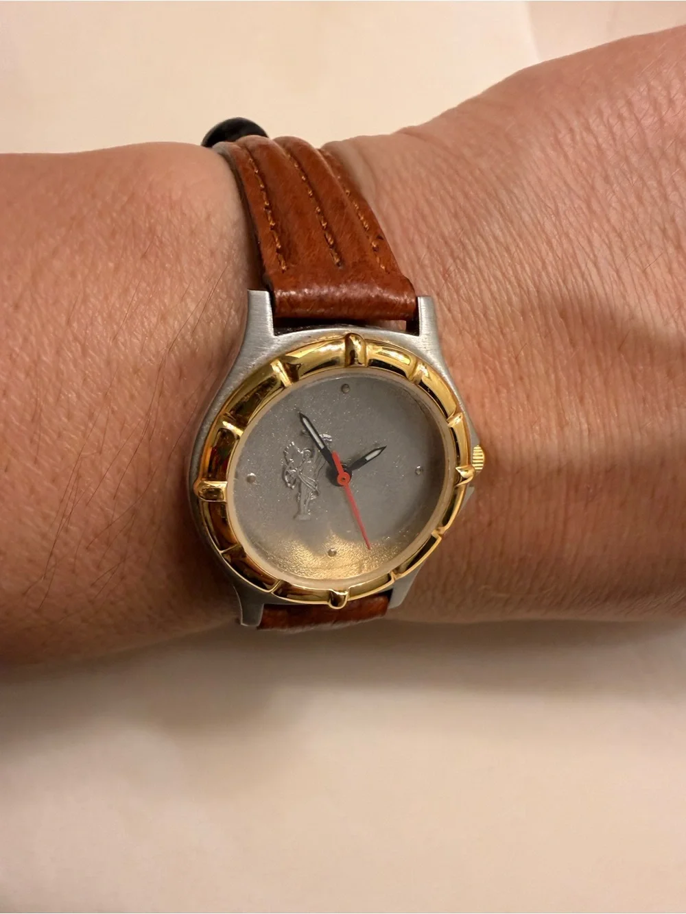 Brown Leather-Strap Watch with Gold-Bezel Accent need battery